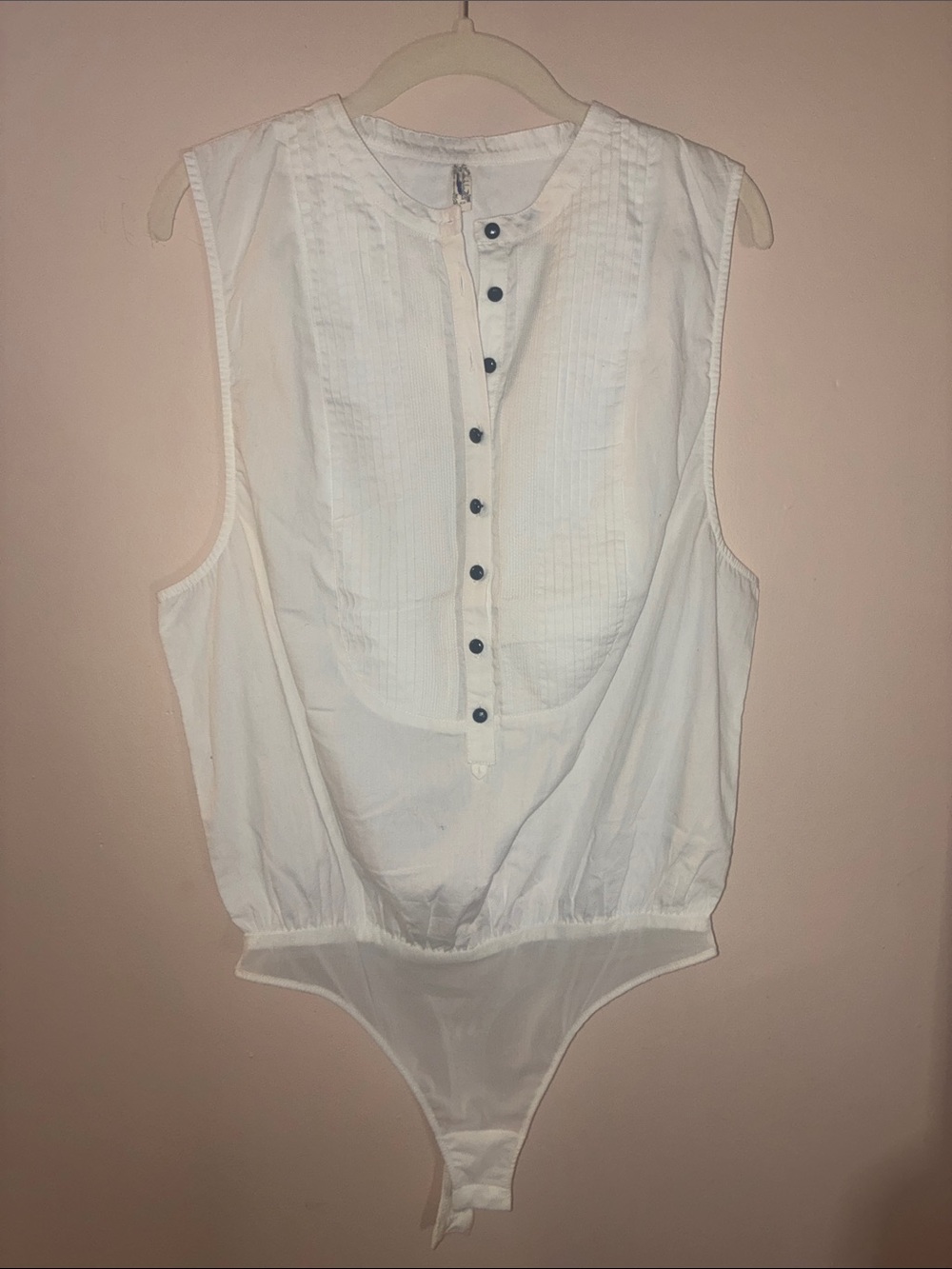 Sleeveless White Pintuck Button-Front Bodysuit